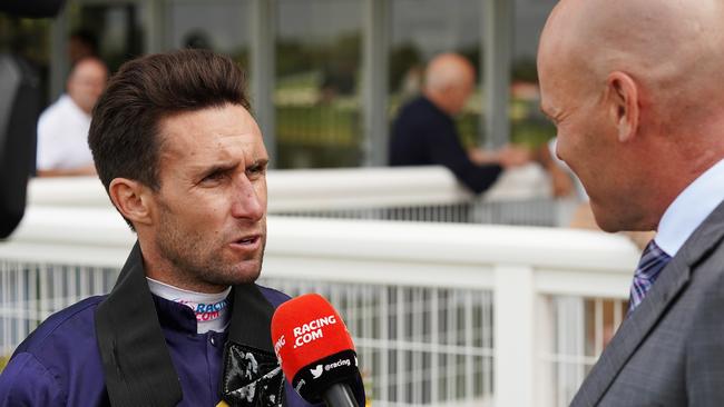 James Winks deals with the media side of being a jockey. Picture: AAP