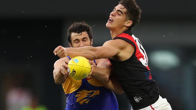 Brandon Zerk-Thatcher attempts to spoil Eagle Josh Kennedy. Picture: Getty