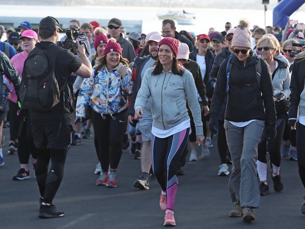 AFL Tasmania CEO Trisha Squires (centre) begins the walk, in the 2019 Point to Pinnacle. Picture: LUKE BOWDEN