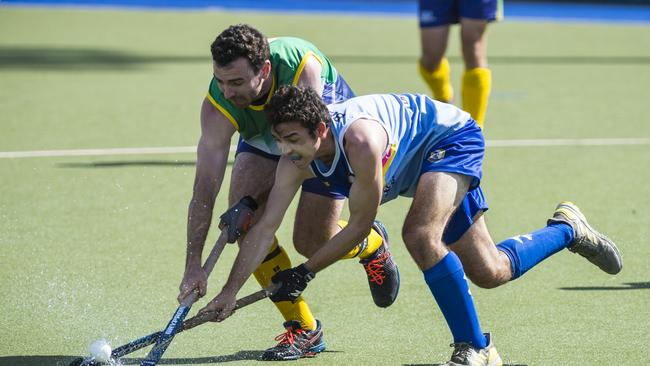 Brisbane player Hugh Pembroke (left) and Josh Bidgood of Toowoomba 1 in Hockey Queensland Championships men's final at Clyde Park, Monday, May 3, 2021. Picture: Kevin Farmer