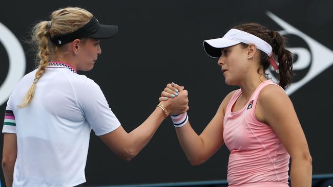 The Gold Coast’s Kimberly Birrell (right) shakes hands with Donna Vekic of Croatia after her victory. Picture: AAP 