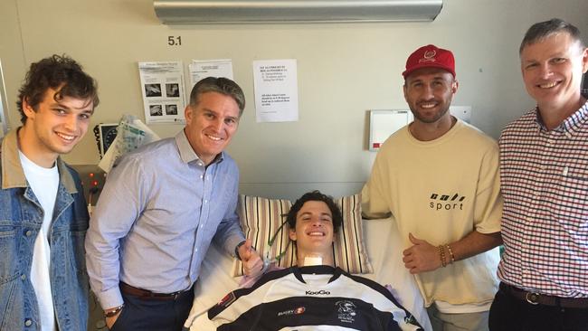 An image tweeted by Conor Tweedy's father, showing Conor meeting Quade Cooper and Tim Horan. https://twitter.com/ConorTweedy/status/1024832861562527744