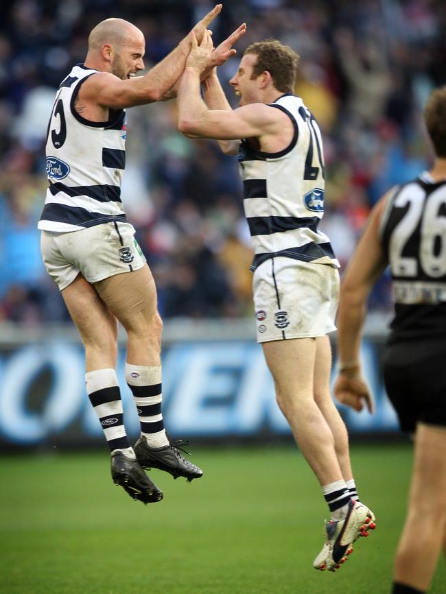 Chapman and Johnson celebrate a goal during the 2009 Grand Final.