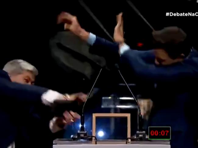 A candidate for mayor of Sao Paulo has physically attacked his challenger with a chair during a televised debate.