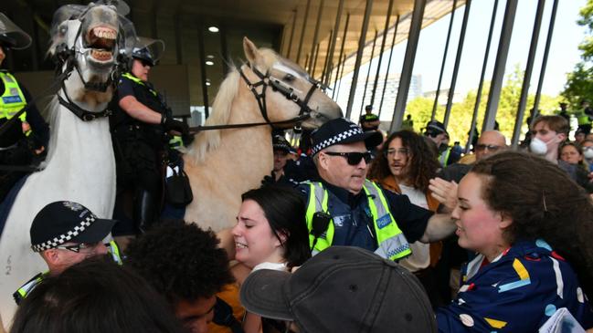 Protesters clashed with police outside the IMARC protests at the Melbourne Convention and Exhibition Centre. Picture: Jake Nowakowski