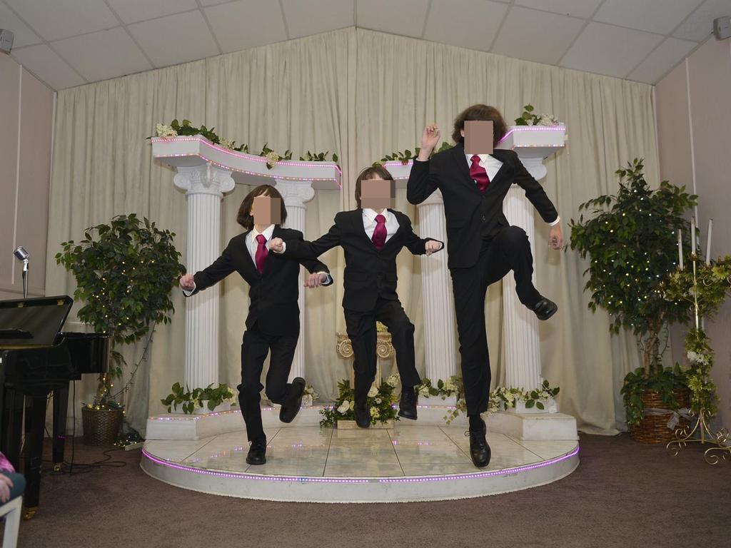 The three Turpin boys leap up in a dance at Las Vegas on a rare outing for the siblings who were kept locked up and chained.