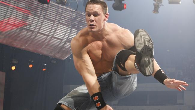 Wrestling champ John Cena in action in the ring