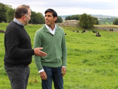 Yorkshire dairy farmer Ian Carlisle and UK treasurer Rishi Sunak