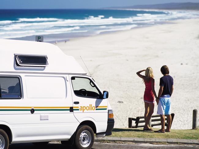 A couple after getting out of their Campervan, look at Main Beach, Point Lookout, North Stradbroke Island. Pic Tourism Queensland