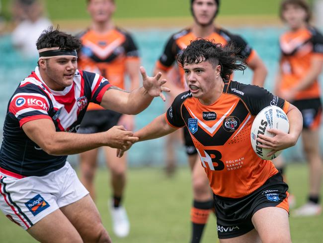 Cooper Rauhihi breaks a tackle. Picture: Julian Andrews