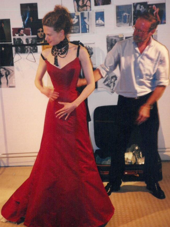 Launceston corset maker Anthony Phillips fits Nicole Kidman for one of her Moulin Rouge costumes, in 2000. Picture: Supplied