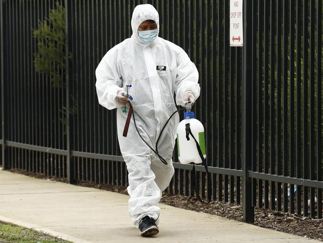 MELBOURNE, AUSTRALIA - JUNE 23: Cleaning crews work to deep clean Keilor Views Primary School on June 23, 2020 in Melbourne, Australia. Two primary schools in Melbourne were closed on Tuesday after students tested positive for COVID-19. Brunswick East Primary School and Keilor Views Primary School will remain closed for at least three days for contact tracing and cleaning. Both schools are in local government areas identified as Melbourne coronavirus hotspots, with the Australian Health Protection Principal Committee urging people to avoid travelling in or out of Hume, Brimbank, Darebin, Moreland, Casey and Cardinia. (Photo by Darrian Traynor/Getty Images)