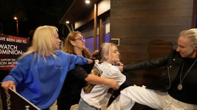 Tash Peterson (middle) was part of the chaotic protest at Fyre restaurant on Friday. Picture: Instagram @Vganbooty @worlddomion.org