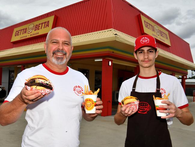 Betta Coffee & Betta Burgers owner Rob Aumend with a Brisket Burger and Nicolai Robinson with a Signature Cheese Burger. Picture: Evan Morgan