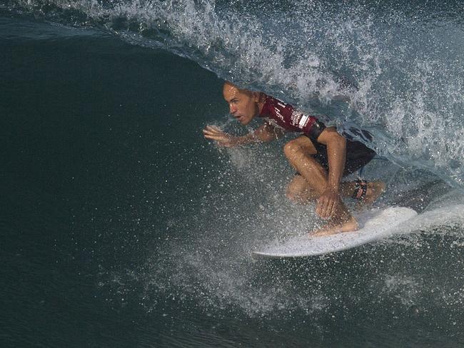 FILE - In this May 12, 2015 file photo, U.S. surfer Kelly Slater competes in the 2015 Oi Rio Pro World Surf League competition at Barra da Tijuca beach in Rio de Janeiro, Brazil. (AP Photo/Leo Correa, File)