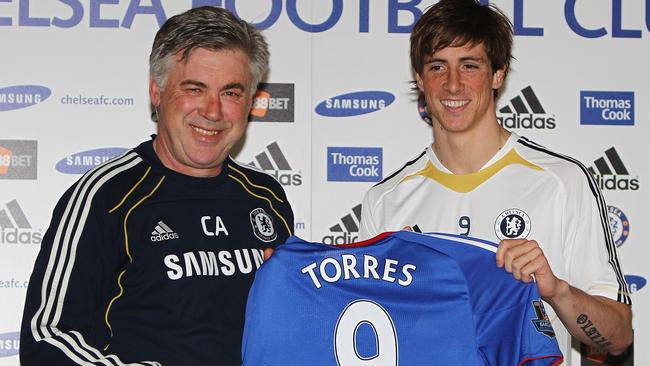 Carlo Ancelotti (L) and Fernando Torres.