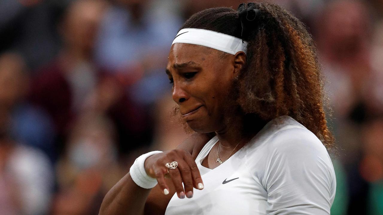 US player Serena Williams reacts as she withdraws from her women's singles first round match against Belarus's Aliaksandra Sasnovich on the second day of the 2021 Wimbledon Championships at The All England Tennis Club in Wimbledon, southwest London, on June 29, 2021. (Photo by Adrian DENNIS / AFP) / RESTRICTED TO EDITORIAL USE