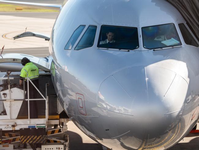 Pilots seen in the cockpit of a Jetstar aircraft at Sydney Airport, Sydney, Friday, June 19, 2020. Qantas Group chief executive Alan Joyce says almost 400,000 seats have been sold on Qantas and JetstarÃ¢â¬â¢s domestic networks in the past two weeks, after some state borders opened. (AAP Image/James Gourley) NO ARCHIVING