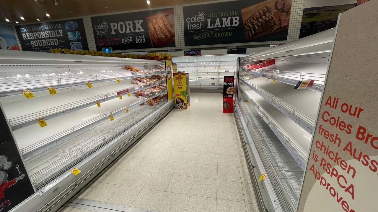 People are loading up trolleys at Bushland Beach Coles. Picture: Daneka Hill