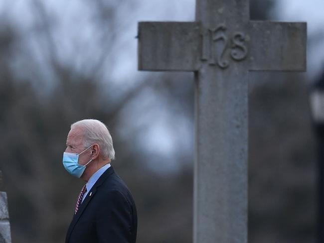 US President-elect Joe Biden leaves St. Joseph on the Brandywine Roman Catholic Church on January 16, 2021 in Wilmington, Delaware. - President-elect Joe Biden will sign executive orders on Inauguration Day next week to address the pandemic, the ailing US economy, climate change and racial injustice in America, a senior aide said Saturday. (Photo by Angela Weiss / AFP)