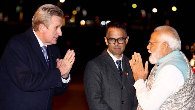 India's Prime Minister Narendra Modi (R) is greeted by Barry O’Farrell, Australia’s High Commissioner to India. Picture: David Gray / POOL / AFP