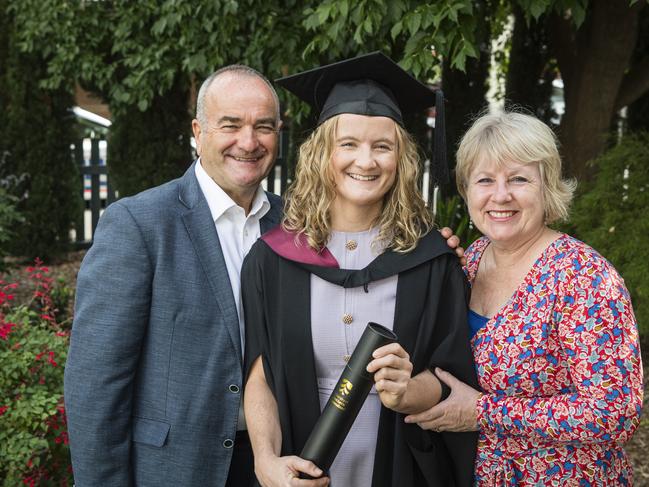 Bachelor of Engineering graduate Fern Proctor with parents Neale and Rosie Proctor at a UniSQ graduation ceremony at Empire Theatres, Tuesday, February 13, 2024. Picture: Kevin Farmer