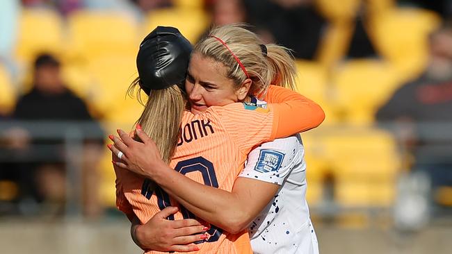 Danielle Van De Donk and Lindsey Horan embrace after the 1-1 draw. Picture: Getty