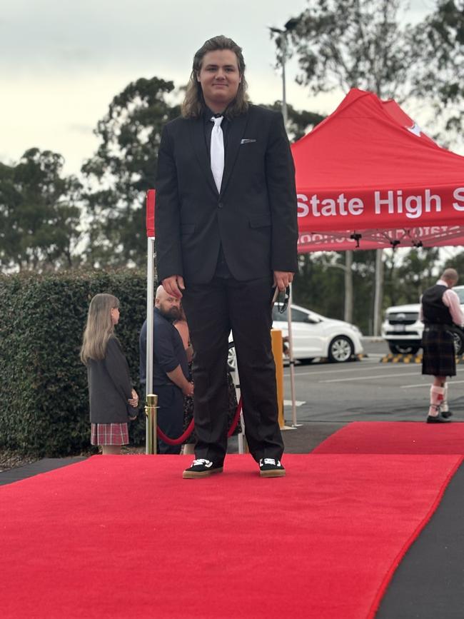 The students of Urangan State High School celebrating their formal.