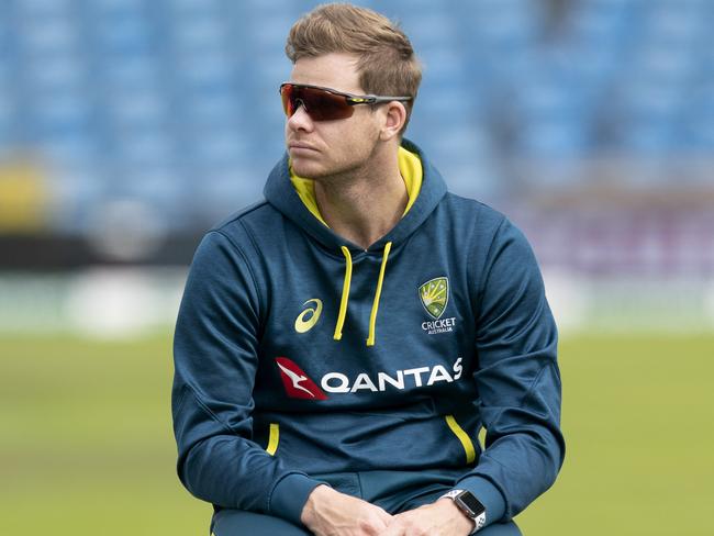 Australia's Steve Smith,centre, watches during a nets training session at Headingley cricket ground in Leeds, England Wednesday,