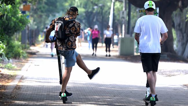 Lime Scooters in use in the Brisbane Botanical Gardens. Picture: AAP/David Clark