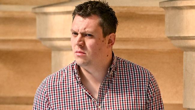 ADELAIDE, AUSTRALIA - NewsWire Photos October 18, 2023: Former Yorke Peninsula school teacher Thomas Ackland enters the Adelaide Magistrates Court where he is facing charges for multiple child-sex offences. Picture: NCA NewsWire / Brenton Edwards