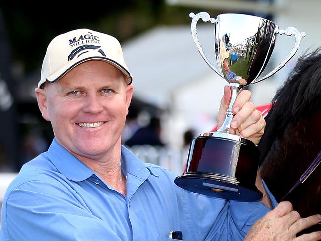 Cairns Amateurs Cup race day. Race 6 CARLTON MID AMATEUR CUP OPEN Handicap winners Mackay trainer John Manzelmann and Jockey Robert Thompson with horse Richie Rocket. PICTURE: STEWART McLEAN