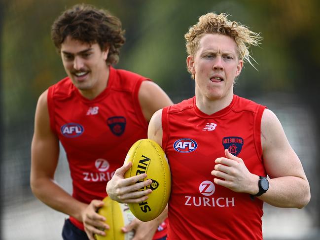 Luke Jackson and Clayton Oliver run laps during a Demons AFL training session at Gosch's Paddock. (Photo by Quinn Rooney/Getty Images)