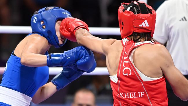 Algeria's Imane Khelif lands a punch on Italy’s Angela Carini in their controversial Women's 66kg preliminary round match at the Paris Olympic Games. Picture: Fabio Bozzani/Anadolu via Getty Images