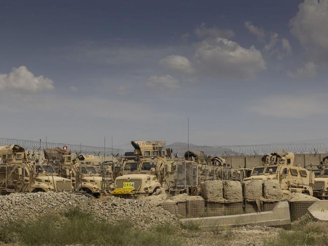 Hundreds of cars, trucks and buses were left at the base by the U.S. military. PHOTO: PAULA BRONSTEIN/THE WALL STREET JOURNAL