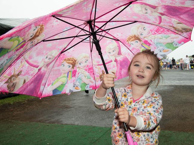 Two-year-old, Amelia Dove, had the perfect umbrella for the rain on Saturday at the Heritage Bank Toowoomba Royal Show. Saturday April 20th, 2024 Picture: Bev Lacey