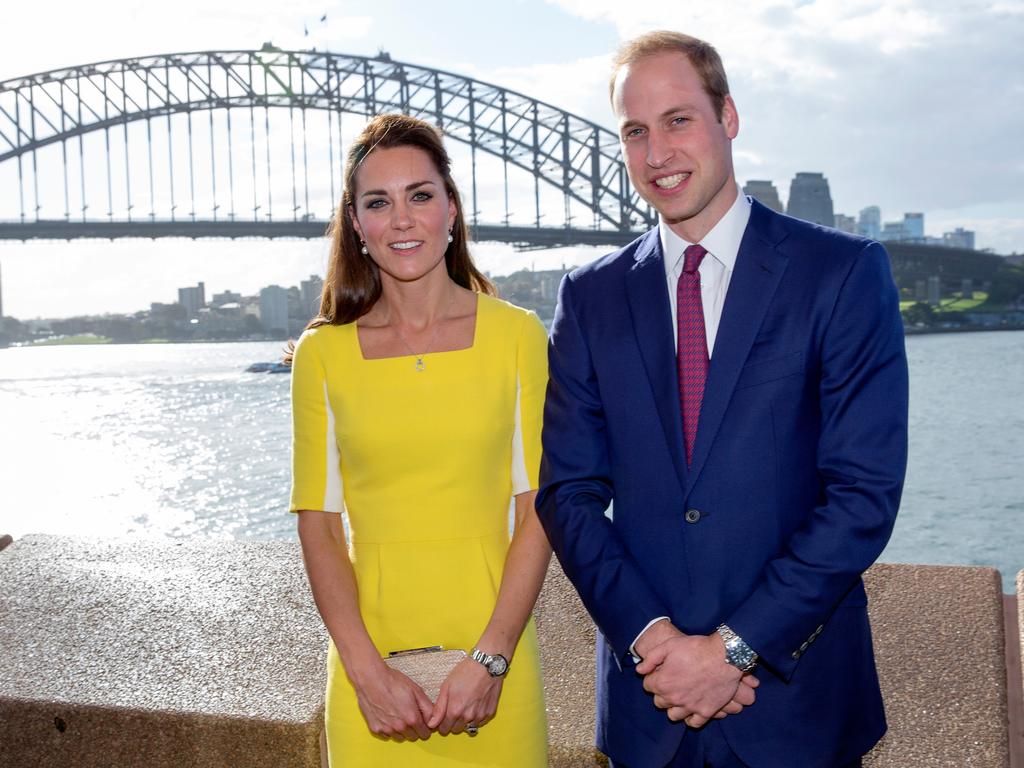 Catherine and William pose for a classic shot in front of Sydney Harbour Bridge as they visit the Opera House. )