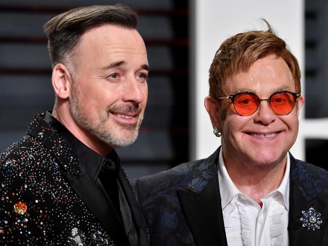 Elton John with his husband David Furnish, earlier this year. Picture: Pascal Le Segretain/Getty Images