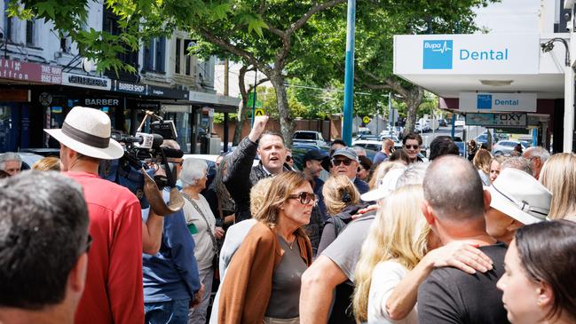 Local residents and Brighton MP James Newbury protest as Premier Jacinta Allan announces the Victorian government’s housing plan. Picture: Nadir Kinani/NewsWire