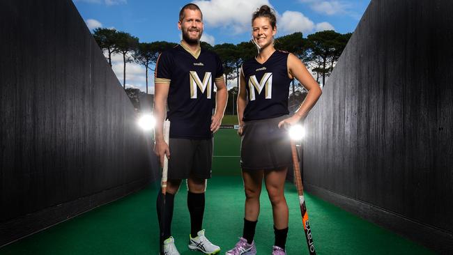 Hockey Club Melbourne pair Aaron Kleinschmidt and Sophie Taylor show of the club’s new colours. Picture: Supplied/Hockey Australia