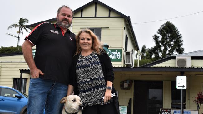 Eungella General Store owners Jamie Mussig and Michaela Pritchard with their shop pets, Tully the dog and Sammy aka Chookie the ringneck parrot, wanted to thank the community for all its support. Picture: Heidi Petith