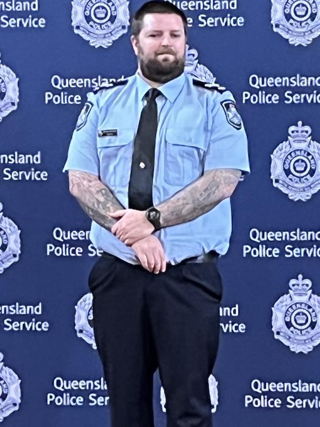 Senior Constable Trent King at the medal ceremony.