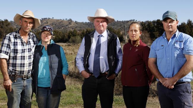 Former deputy Prime Minister and member for New England Barnaby Joyce in Dungowan with angry farmers from left Tim and Courtney Skerrett, Jacqui Gidley-Baird and Josh Crowe who are facing having high voltage transmission lines built on their property. Picture: Jonathan Ng