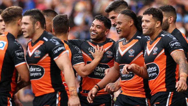 David Nofoaluma celebrates scoring a try (Photo by Cameron Spencer/Getty Images)