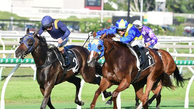 Tycoon Evie (outside) winning at Eagle Farm. Picture: Trackside Photography