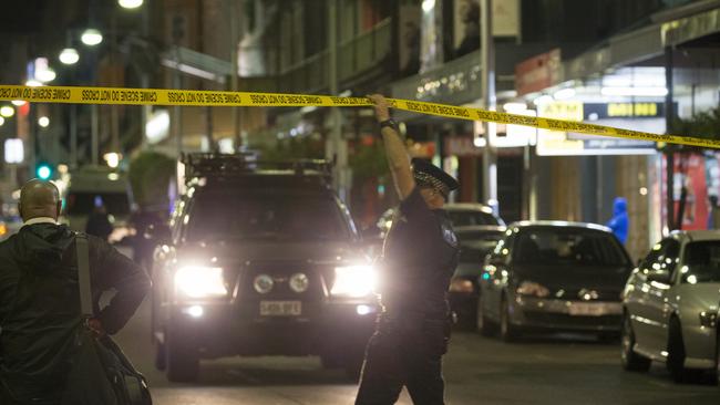 Police closed off Hindley St following the siege which ended with Damien Keith Hall being shot by a STAR Group officer. Picture: Scott Oates