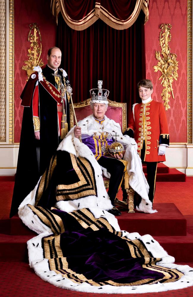 King Charles III, Prince William, and Prince George of Wales posing in the Throne Room of Buckingham Palace in London. Picture: AFP