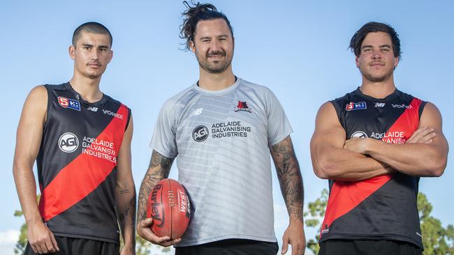 New West Adelaide Football Club coach Adam Hartlett with recruits Rhys Nicholls and Dylan Bramich. Picture: Emma Brasier