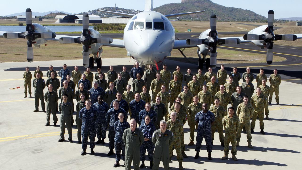 US and Australian military personnel stand together during joint war games but will the alliance last?