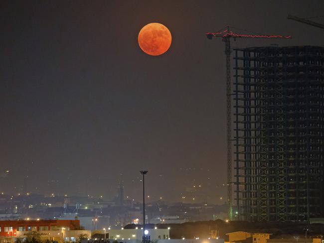 The moon rises over Tehran in Iran, Monday, Nov. 14, 2016. Picture: AP Photo/Ebrahim Noroozi